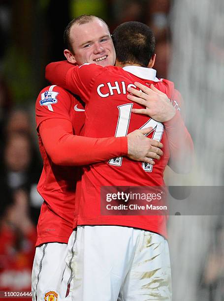Wayne Rooney of Manchester United celebrates scoring his side's second goal with teammate Javier Hernandez during the FA Cup sponsored by E.On Sixth...