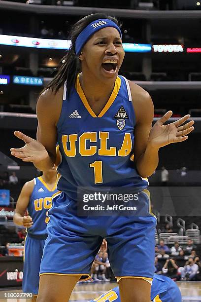 Nina Earl of the UCLA Bruins reacts in the second half after she is called for a foul while taking on the Stanford Cardinal in the championship game...