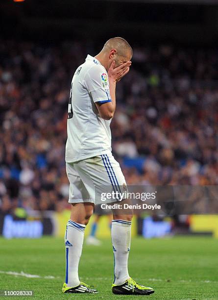 Karim Benzema of Real Madrid reacts during the La Liga match between Real Madrid and Hercules CF at Estadio Santiago Bernabeu on March 12, 2011 in...