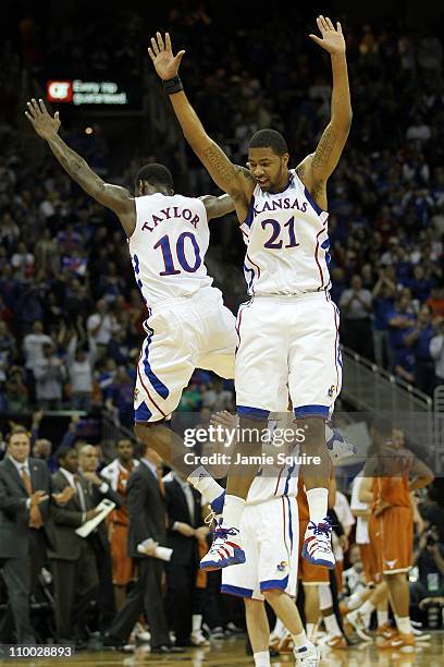 Markieff Morris and Tyshawn Taylor of the Kansas Jayhawks celebrate after a play against the Texas Longhorns in the first half of the 2011 Phillips...