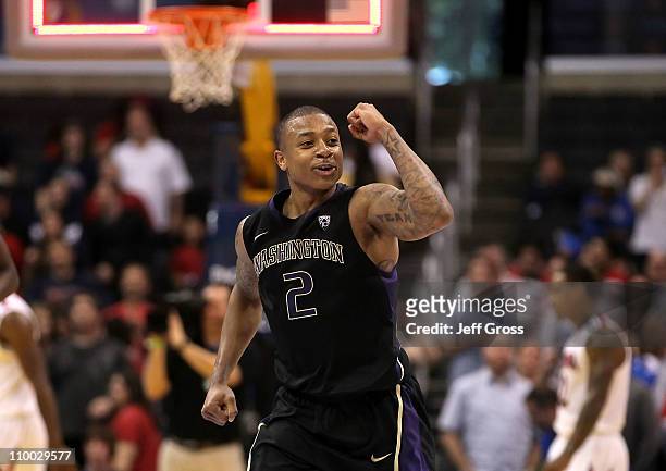 Isaiah Thomas of the Washington Huskies reacts as the Arizona Wildcats miss a buzzer shot and the game goes into overtime in the championship game of...
