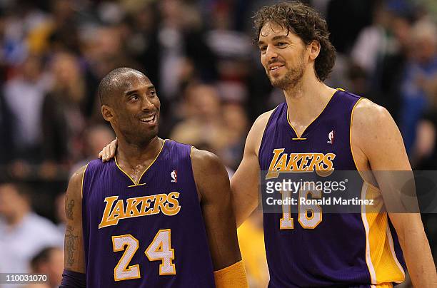 Kobe Bryant and Pau Gasol of the Los Angeles Lakers react after a 96-91 win against the Dallas Mavericks at American Airlines Center on March 12,...