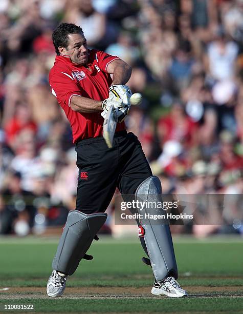 Marc Ellis bats during the Christchurch Earthquake Relief Charity Twenty20 match at Basin Reserve on March 13, 2011 in Wellington, New Zealand.