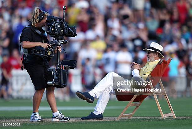 Sir Ian McKellen relaxes on the pitch during the Christchurch Earthquake Relief Charity Twenty20 match at Basin Reserve on March 13, 2011 in...