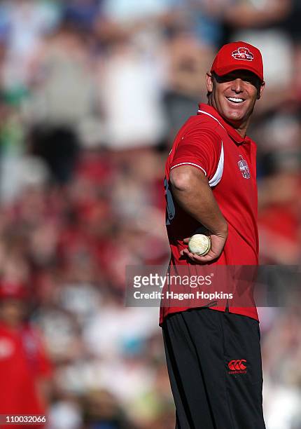 Shane Warne enjoys a laugh during the Christchurch Earthquake Relief Charity Twenty20 match at Basin Reserve on March 13, 2011 in Wellington, New...