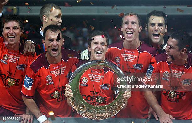 Matt McKay and team mates celebrate victory after the A-League Grand Final match between the Brisbane Roar and the Central Coast Mariners at Suncorp...