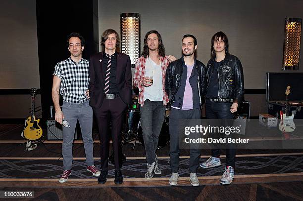 Albert Hammond Jr, Nikolai Fraiture, Nick Valensi, Fabrizio Moretti and Julian Casablancas of The Strokes attend a meet and greet prior to their...