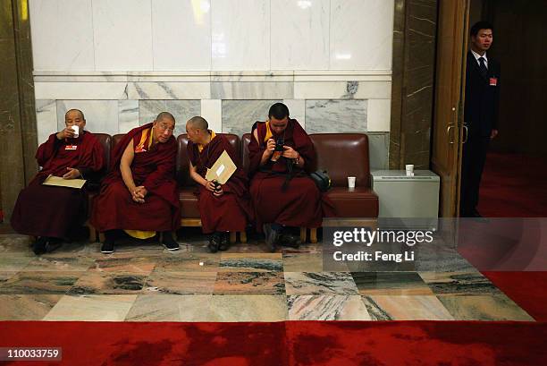 The Tibetan delegates attend the closing session of the Chinese People's Political Consultative Conference at the Great Hall of the People on March...