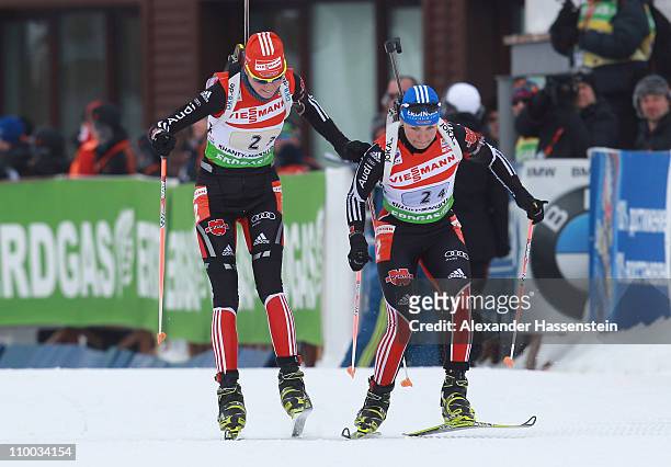 Tina Bachmann of Germany hands over to her team mate Magdalena Neuner at the women's relay during the IBU Biathlon World Championships at A.V....