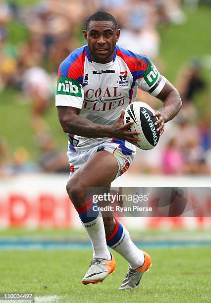 Wes Naiqama of the Knights runs with the ball during the round one NRL match between the Penrith Panthers and the Newcastle Knights at Centrebet...