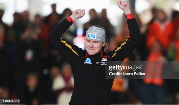 Jenny Wolf of Germany celebrates after winning the 500m heats during Day 4 of the Essent ISU Speed Skating World Cup at the Max Aicher Arena on March...