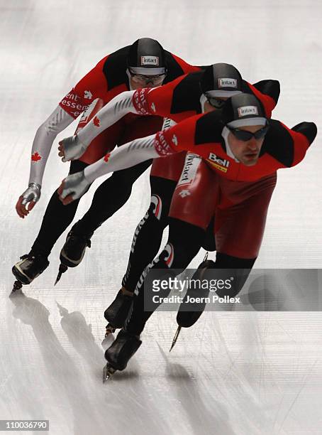 Denny Morrison, Lucas Makowsky and Mathieu Giroux of Canada compete in the mens Team Persuit race during Day 4 of the Essent ISU Speed Skating World...