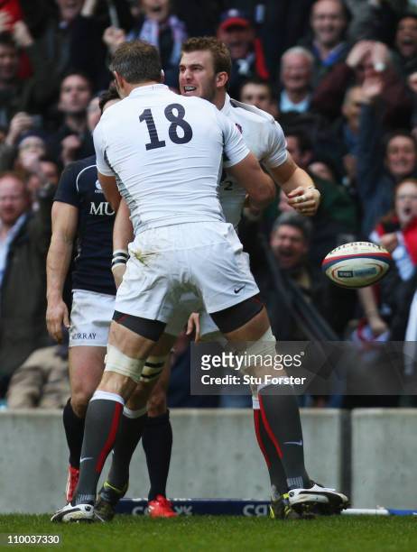Tom Croft of England celebrates with Simon Shaw as he scores the first try during the RBS 6 Nations Championship match between England and Scotland...