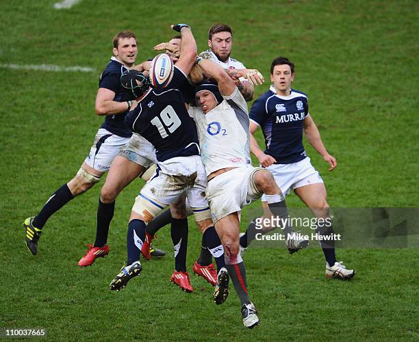 Man of the Match James Haskell of England and team mate Matt Banahan battle for possession with Alasdair Strokosch of Scotland during the RBS Six...