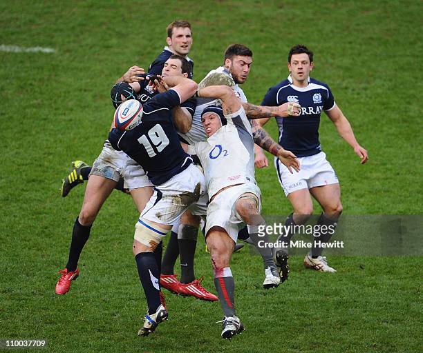 Man of the Match James Haskell of England and team mate Matt Banahan battle for possession with Alasdair Strokosch of Scotland during the RBS Six...
