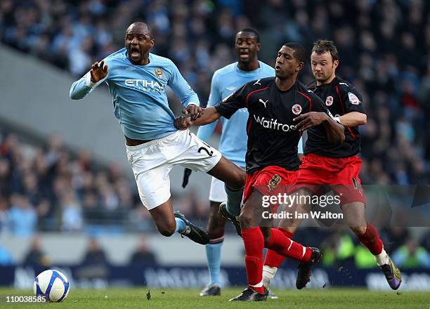 Patrick Vieira of Manchester City falls to the ground after being challenged by Mikele Leigertwood of Reading during the FA Cup sponsored by E.On...