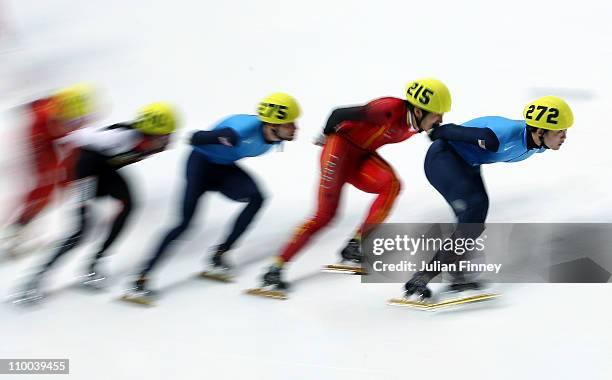 Simon Cho of USA leads the pack in the 3000m super final during day three of the ISU World Short Track Speed Skating Championships at Sheffield Arena...