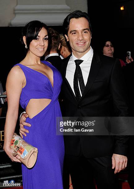 Actor Ramin Karimloo and wife Mandy Karimloo attend The Olivier Awards 2011 at Theatre Royal on March 13, 2011 in London, England.