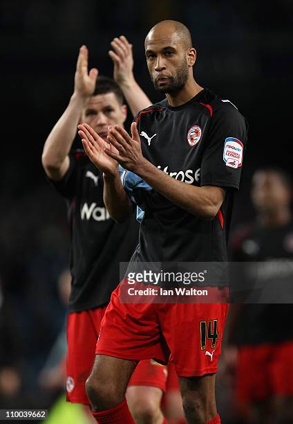 Dejected Jimmy Kebe of Reading applauds the fans after defeat in the FA Cup sponsored by E.On Sixth Round match between Manchester City and Reading...
