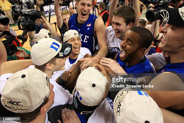 The Duke Blue Devils celebrate after their 75-58 victory over the North Carolina Tar Heels to win the championship game of the 2011 ACC men's...