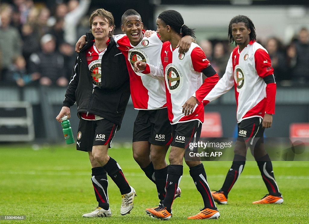 (L-R) Feyenoord's Marcel Meeuwis, Leroy