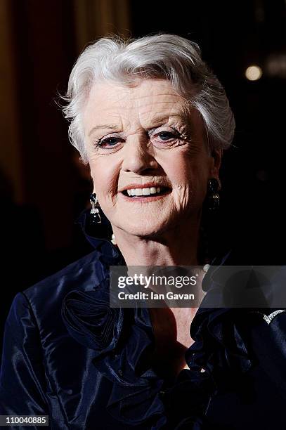 Actress Angela Lansbury poses in the press room during The Olivier Awards 2011 at Theatre Royal on March 13, 2011 in London, England.