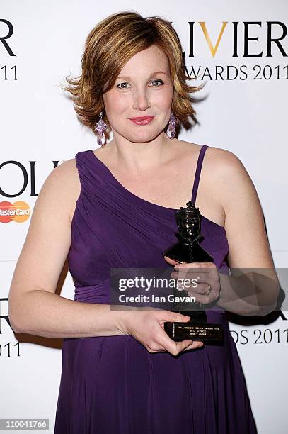 Nancy Carroll, winner of Best Actress for "After the Dance" poses in the press room during The Olivier Awards 2011 at Theatre Royal on March 13, 2011...