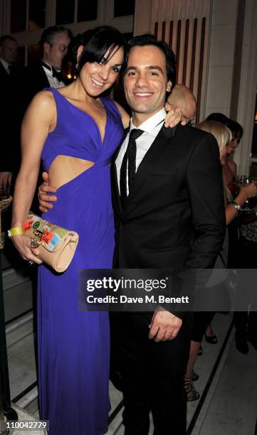 Actor Ramin Karimloo and Mandy Karimloo attend a post-awards gala party following The Olivier Awards 2011 at The Waldorf Hilton Hotel on March 13,...