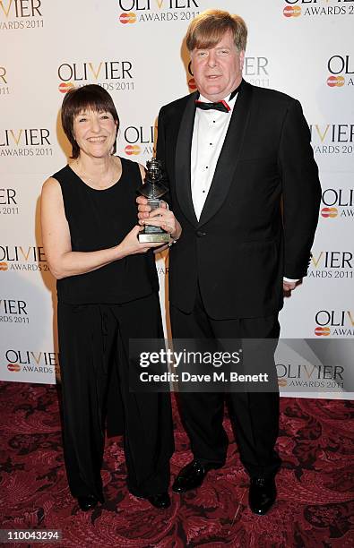 Producers Jenny King and Matthew Gale pose with The Railway Children's award for Best Entertainment in the winner's room during the Olivier Awards...