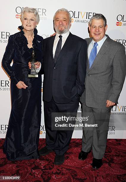 Angela Lansbruy, Society of London Theatre Special Award winner Stephen Sondheim, and Sir Cameron Mackintosh pose in the winner's room during the...