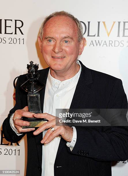Best Director winner Howard Davies poses in the winner's room during the Olivier Awards 2011 at Theatre Royal Drury Lane on March 13, 2011 in London,...