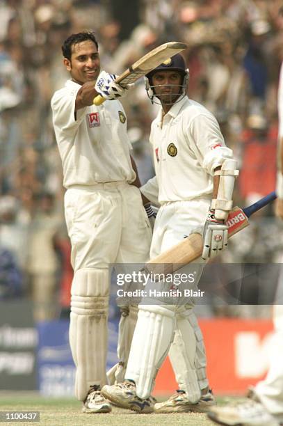 Laxman of India is congratulated by team mate Rahul Dravid after reaching 200, during day four of the 2nd Test between India and Australia played at...