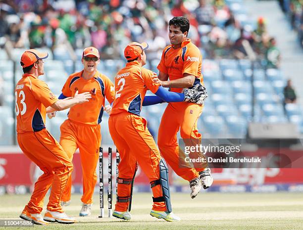 Mudassar Bukhari of the Netherlands celebrates after taking the wicket of Tamim Iqbal of Bangladesh during the 2011 ICC Cricket World Cup group B...