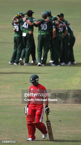 Tatenda Taibu of Zimbabwe walks dejectedly to the pavillion after being dismissed off the bowling of Wahab Riaz during the Pakistan v Zimbabwe 2011...