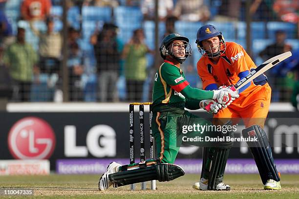 Mushfiqur Rahim of Bangladesh hits the winning runs during the 2011 ICC Cricket World Cup group B match between Bangladesh and the Netherlands at...