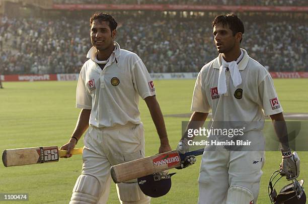 Laxman and Rahul Dravid of India leave the field at the end of play after batting the entire day, after day four of the 2nd Test between India and...