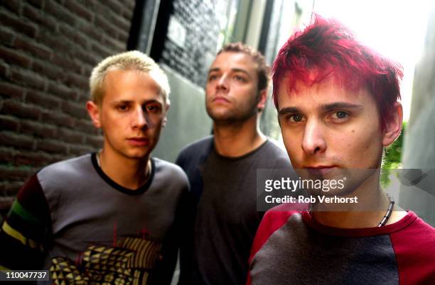 23rd AUGUST: Muse posed in Amsterdam, Netherlands on 23rd August 2001. Left to Right: Dominic Howard, Chris Wolstenholme, Matthew Bellamy