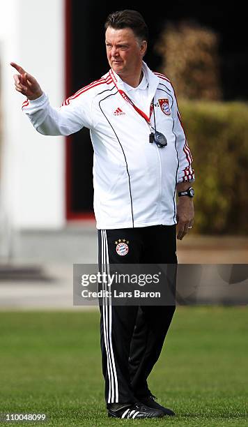 Head coach Louis van Gaal gives instructions during a Bayern Muenchen training session ahead of the UEFA Champions League Round of 16 second leg...