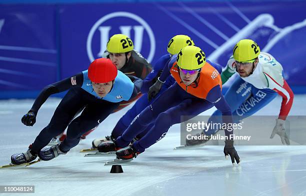 Simon Cho of USA and Sjinkie Knegt of Netherlands lead in the 1000m heats during day three of the ISU World Short Track Speed Skating Championships...