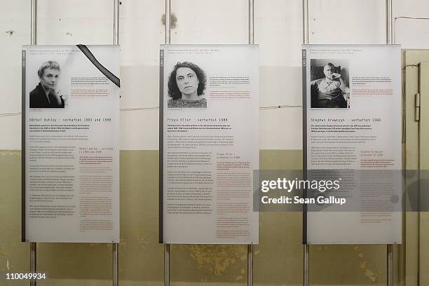 Portraits of former inmates line a corridor at the former prison of the East German Ministry of State Security, also known as the Stasi, at...