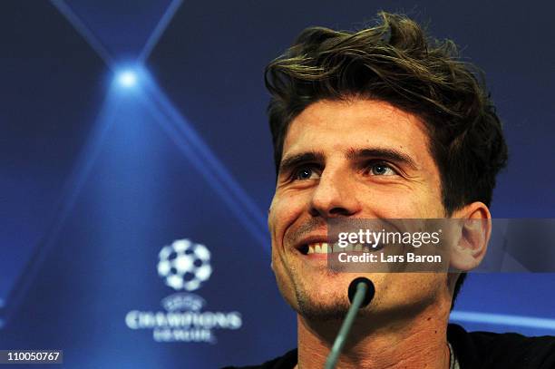 Mario Gomez smiles during a Bayern Muenchen press conference ahead of the UEFA Champions League Round of 16 second leg match against Inter Milan at...