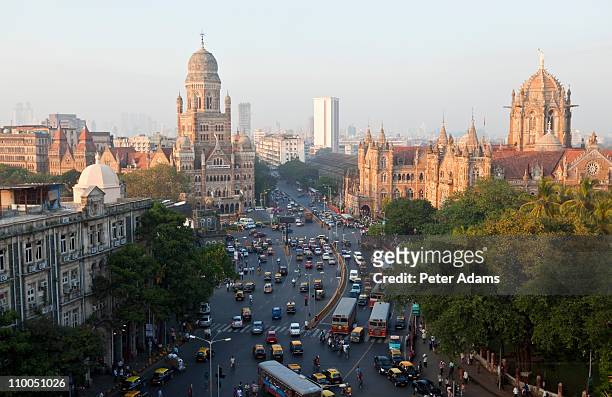 victoria or chhatrapati shivaji terminus, mumbai - indian city roads stock pictures, royalty-free photos & images