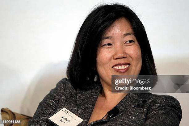 Michelle Rhee, former chancellor of the District of Columbia public school system, smiles during a panel discussion at Stanford University's SIEPR...