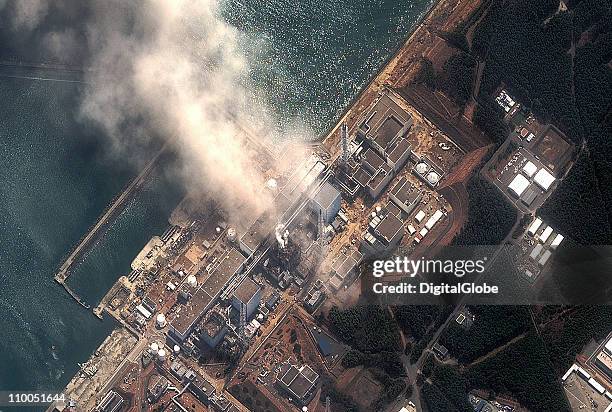 In this satellite view, the Fukushima Dai-ichi Nuclear Power plant after a massive earthquake and subsequent tsunami on March 14, 2011 in Futaba,...