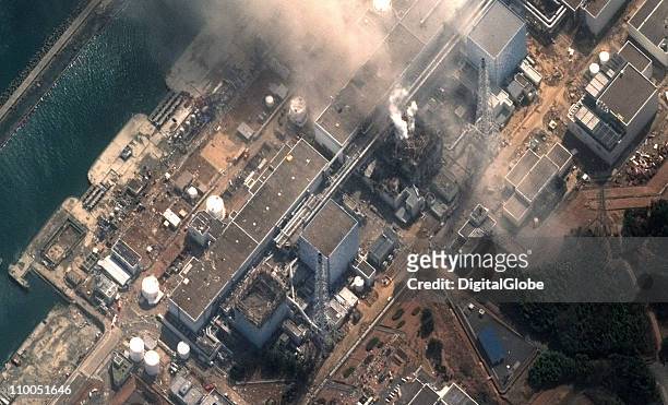 In this satellite view, the Fukushima Dai-ichi Nuclear Power plant after a massive earthquake and subsequent tsunami on March 14, 2011 in Futaba,...