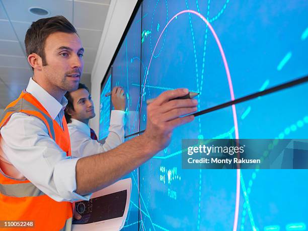 air traffic controllers with simulation - air traffic control operator stock pictures, royalty-free photos & images