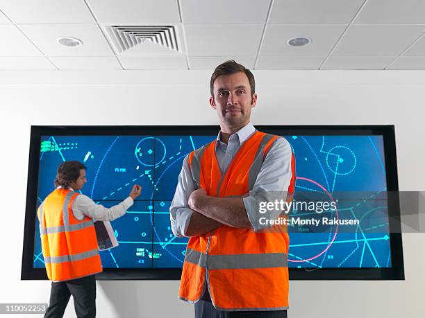 air traffic controllers with screen - airport ground crew stock pictures, royalty-free photos & images