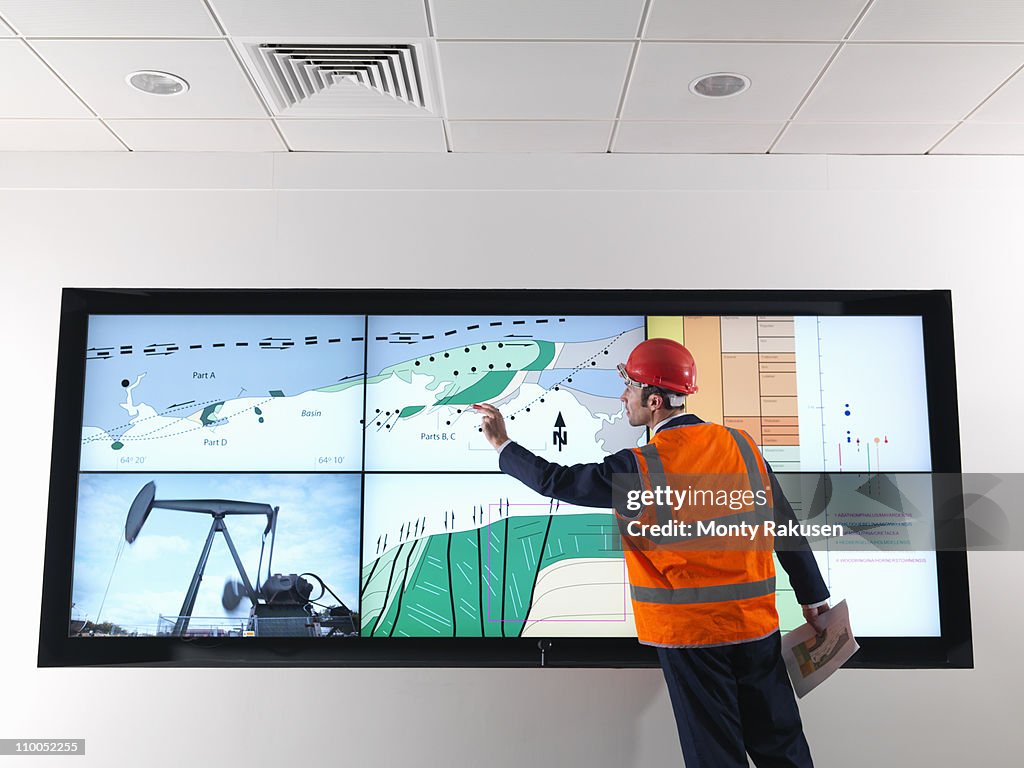 Oil worker with geology screen