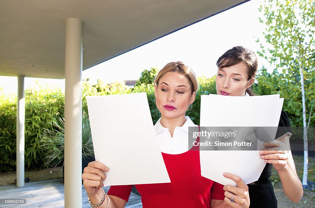 Business women read data