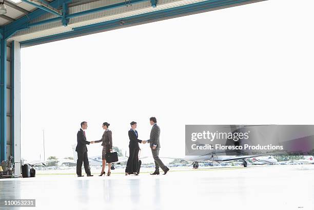 business executives at airport - bristol airport stock pictures, royalty-free photos & images